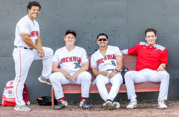 New Jersey Jackals teammates Nicco Toni, Thomas Spinelli, Angelo Baez and Nick Marcon pose for a photo in the bullpen prior to the start of the team's May 31st, 2022 contest against the Trois-Rivieres Aigles. Photo by Phil Hoops